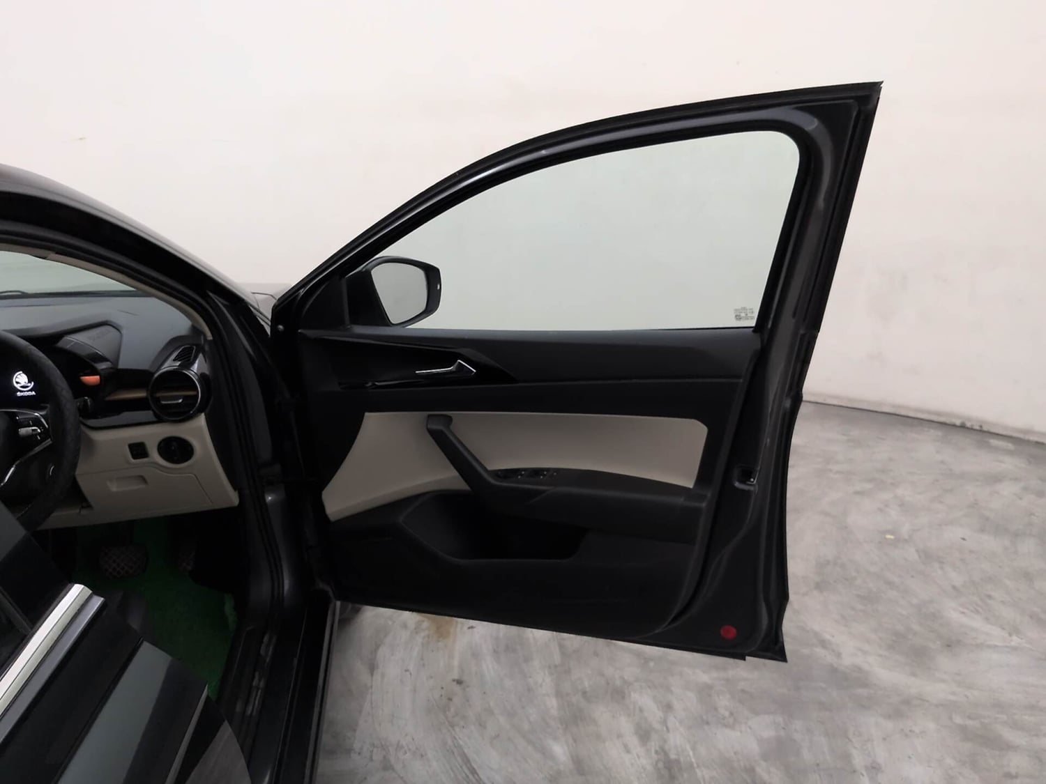 Used 2023 Skoda Slavia Style 1.0L TSI AT Petrol Automatic interior RIGHT FRONT DOOR OPEN VIEW
