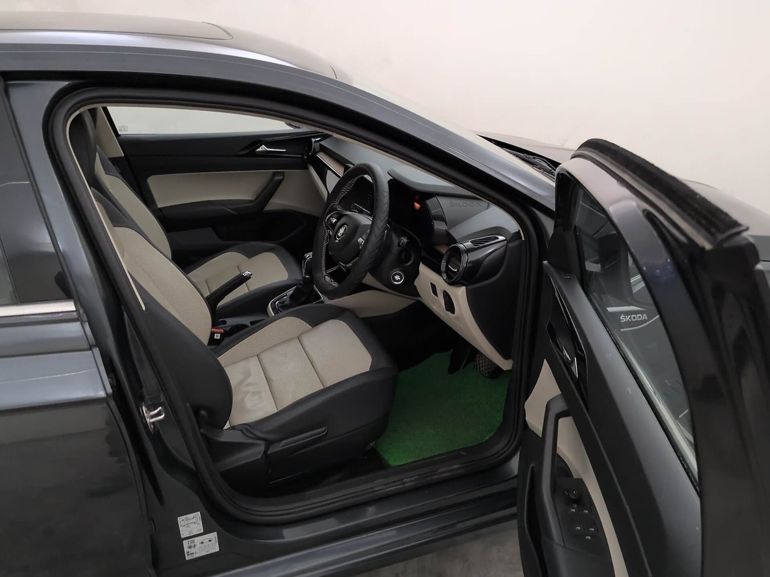 Used 2023 Skoda Slavia Style 1.0L TSI AT Petrol Automatic interior RIGHT SIDE FRONT DOOR CABIN VIEW