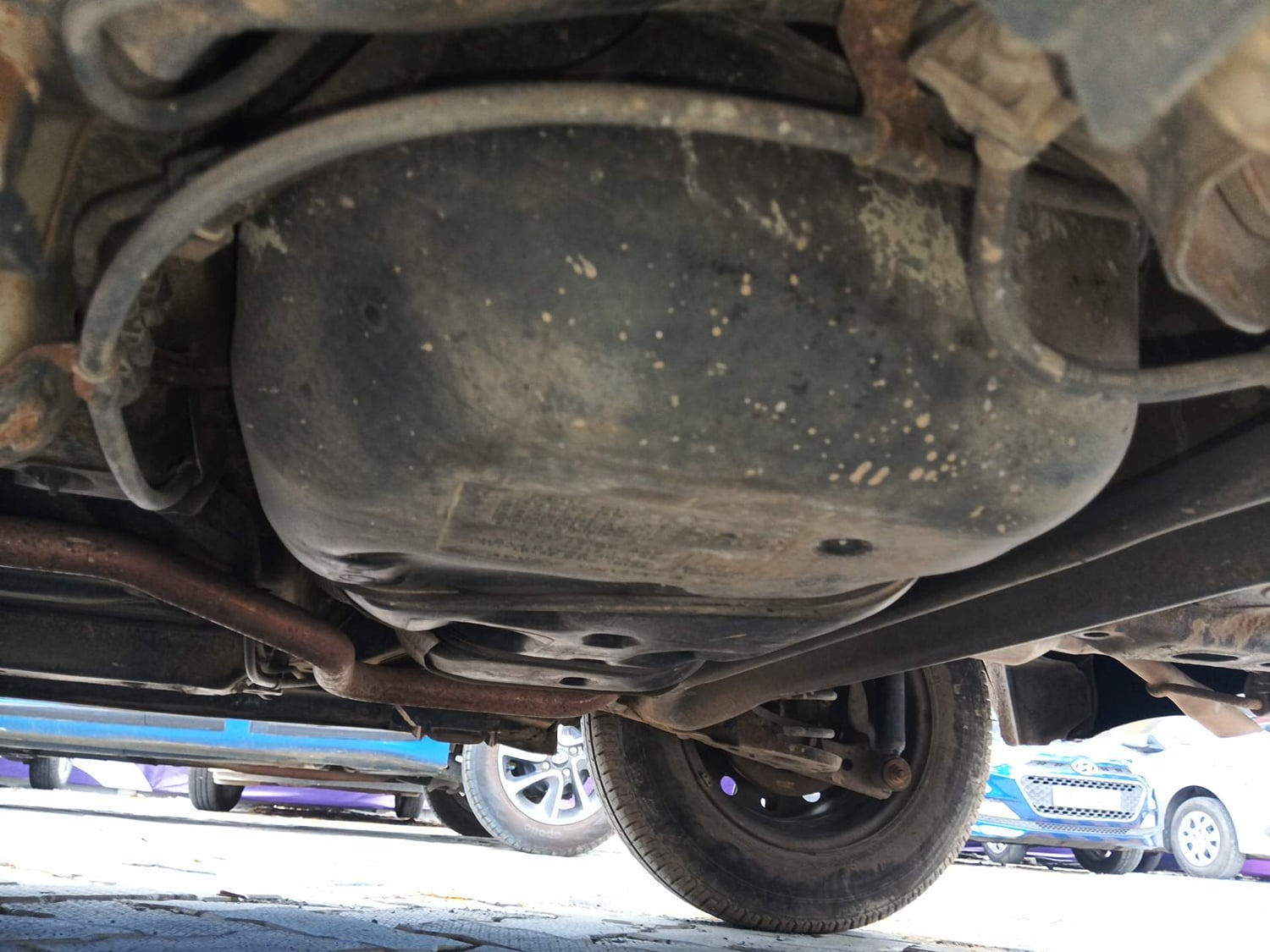 Used 2014 Maruti Suzuki Swift VXi Petrol Manual extra REAR UNDERBODY VIEW (TAKEN FROM REAR)