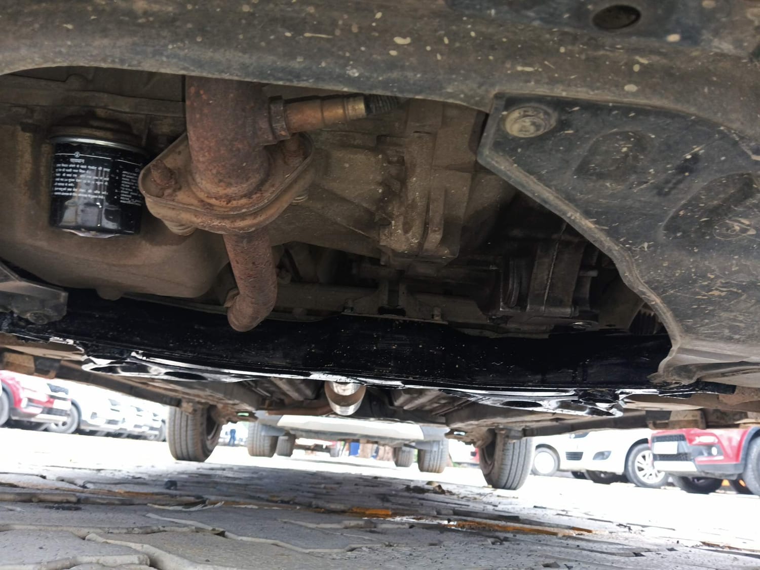 Used 2014 Maruti Suzuki Swift VXi Petrol Manual extra FRONT LEFT UNDERBODY VIEW