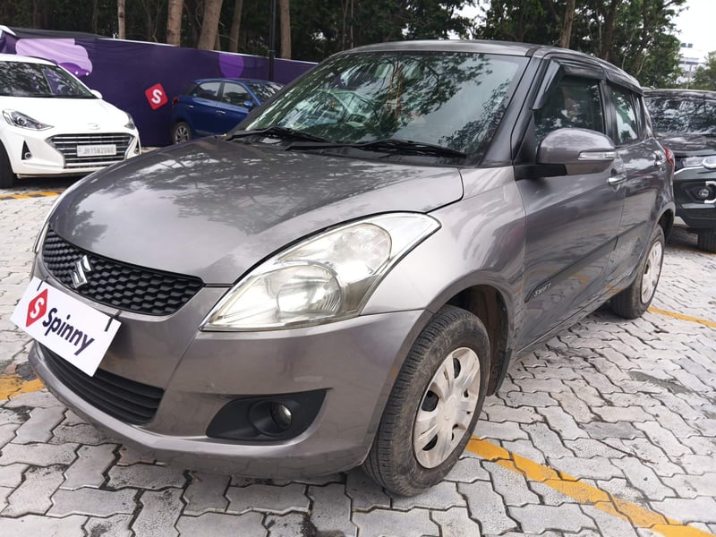 Used 2014 Maruti Suzuki Swift VXi Petrol Manual exterior LEFT FRONT CORNER VIEW
