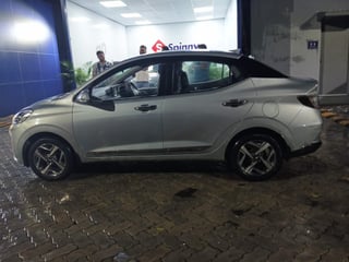 Used 2020 Hyundai Aura SX Plus 1.2 AMT Petrol Petrol Automatic exterior LEFT SIDE VIEW