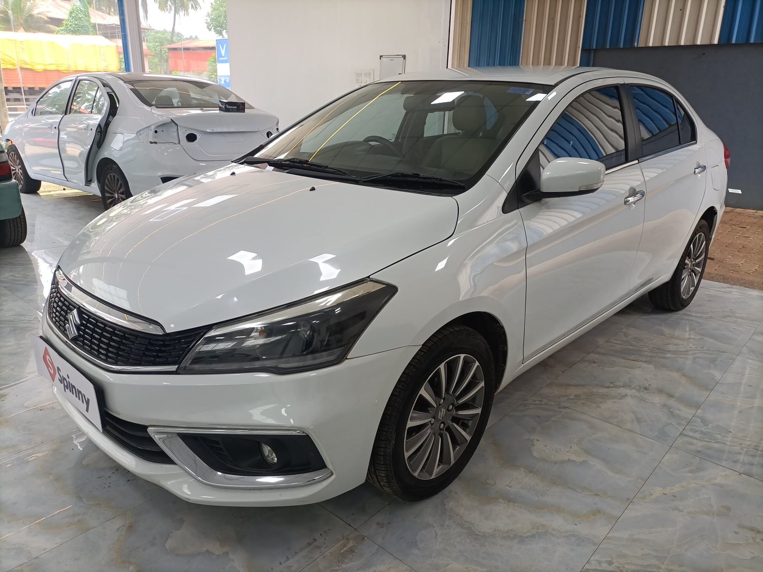 Used 2019 Maruti Suzuki Ciaz Alpha Hybrid 1.5 Petrol Manual exterior LEFT FRONT CORNER VIEW
