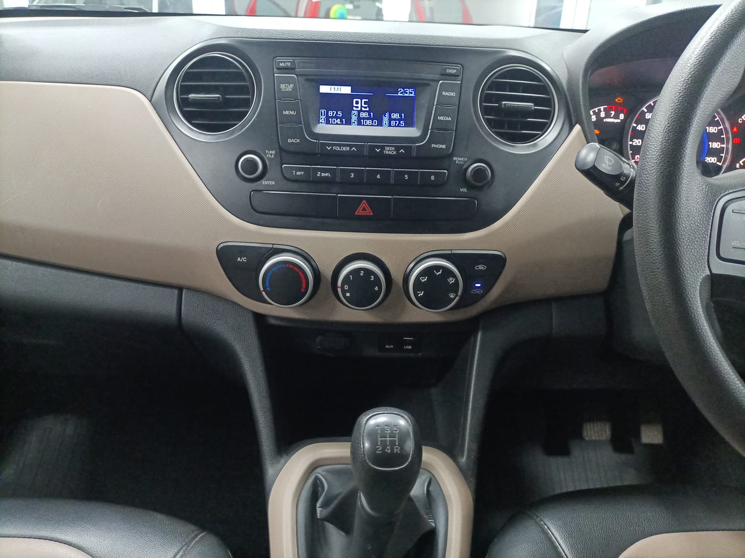 Used 2018 Hyundai Grand i10 Magna 1.2 Kappa VTVT Petrol Manual interior MUSIC SYSTEM & AC CONTROL VIEW