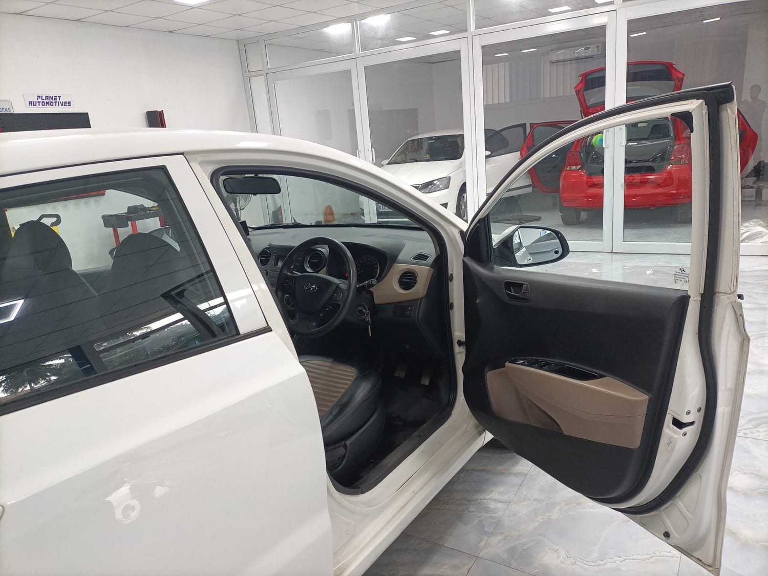 Used 2018 Hyundai Grand i10 Magna 1.2 Kappa VTVT Petrol Manual interior RIGHT FRONT DOOR OPEN VIEW