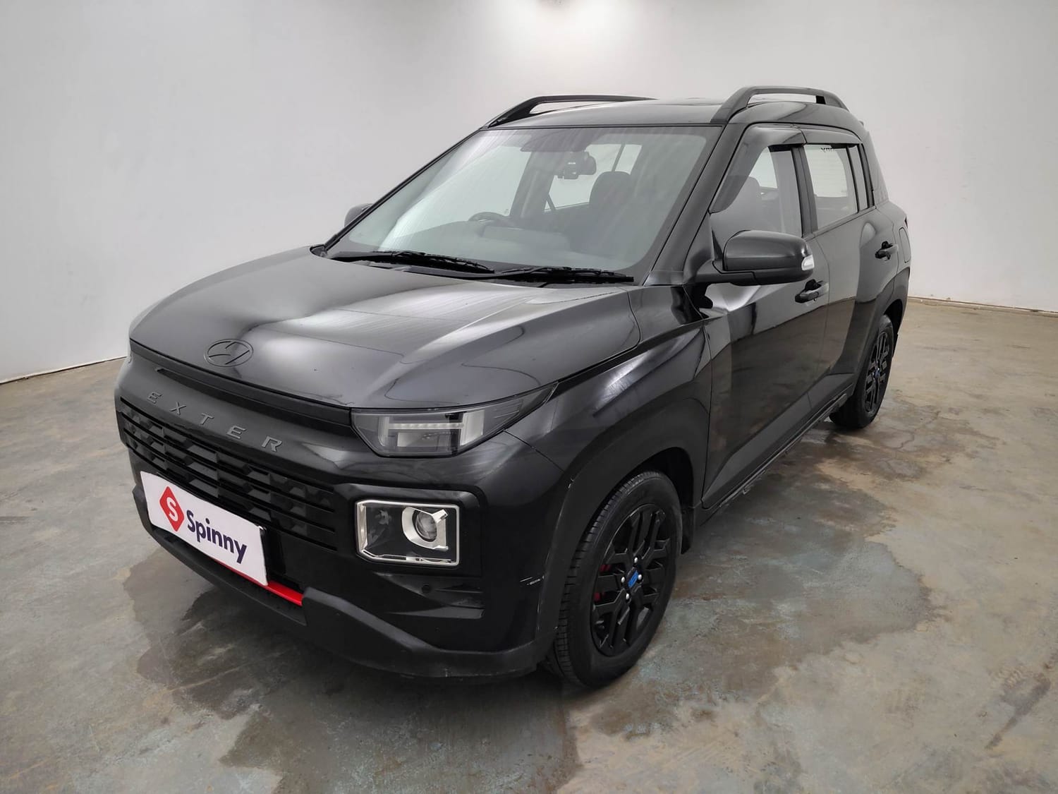 Used 2024 Hyundai Exter SX (O) Connect 1.2 AMT Knight Edition Petrol Automatic exterior LEFT FRONT CORNER VIEW