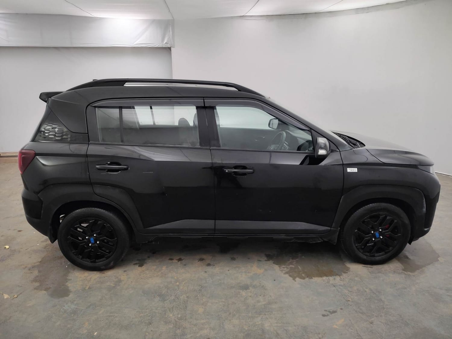 Used 2024 Hyundai Exter SX (O) Connect 1.2 AMT Knight Edition Petrol Automatic exterior RIGHT SIDE VIEW