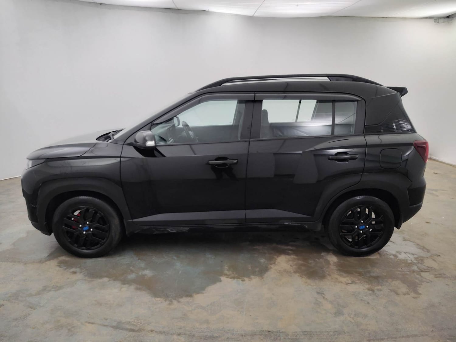 Used 2024 Hyundai Exter SX (O) Connect 1.2 AMT Knight Edition Petrol Automatic exterior LEFT SIDE VIEW