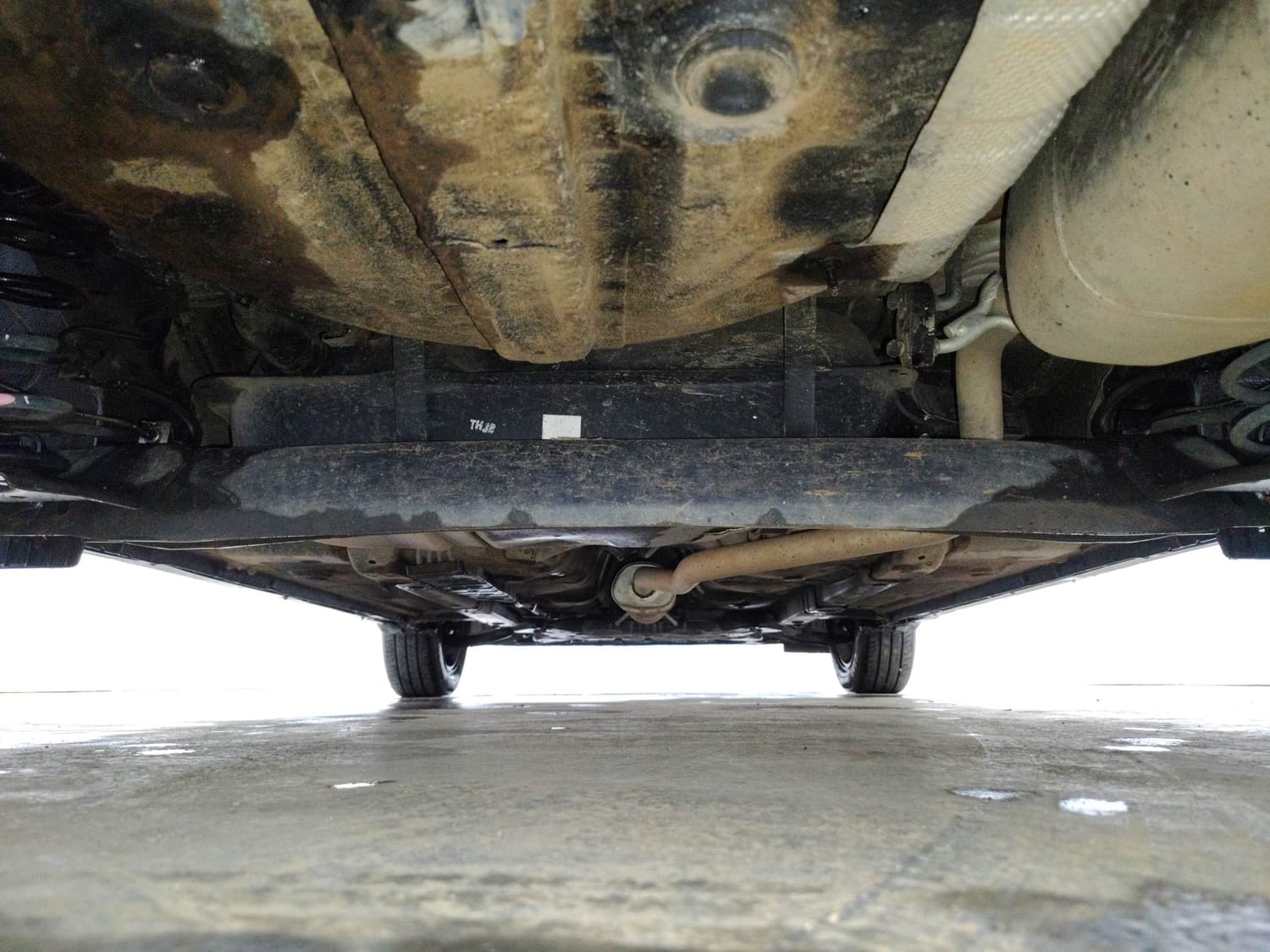 Used 2024 Hyundai Exter SX (O) Connect 1.2 AMT Knight Edition Petrol Automatic extra REAR UNDERBODY VIEW (TAKEN FROM REAR)