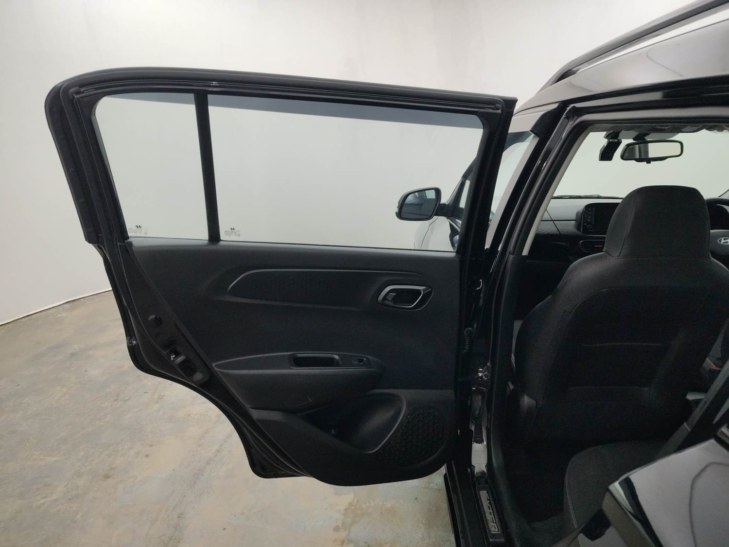 Used 2024 Hyundai Exter SX (O) Connect 1.2 AMT Knight Edition Petrol Automatic interior LEFT REAR DOOR OPEN VIEW