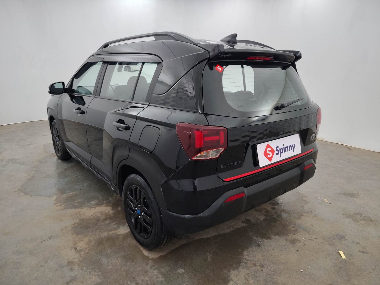 Used 2024 Hyundai Exter SX (O) Connect 1.2 AMT Knight Edition Petrol Automatic exterior LEFT REAR CORNER VIEW