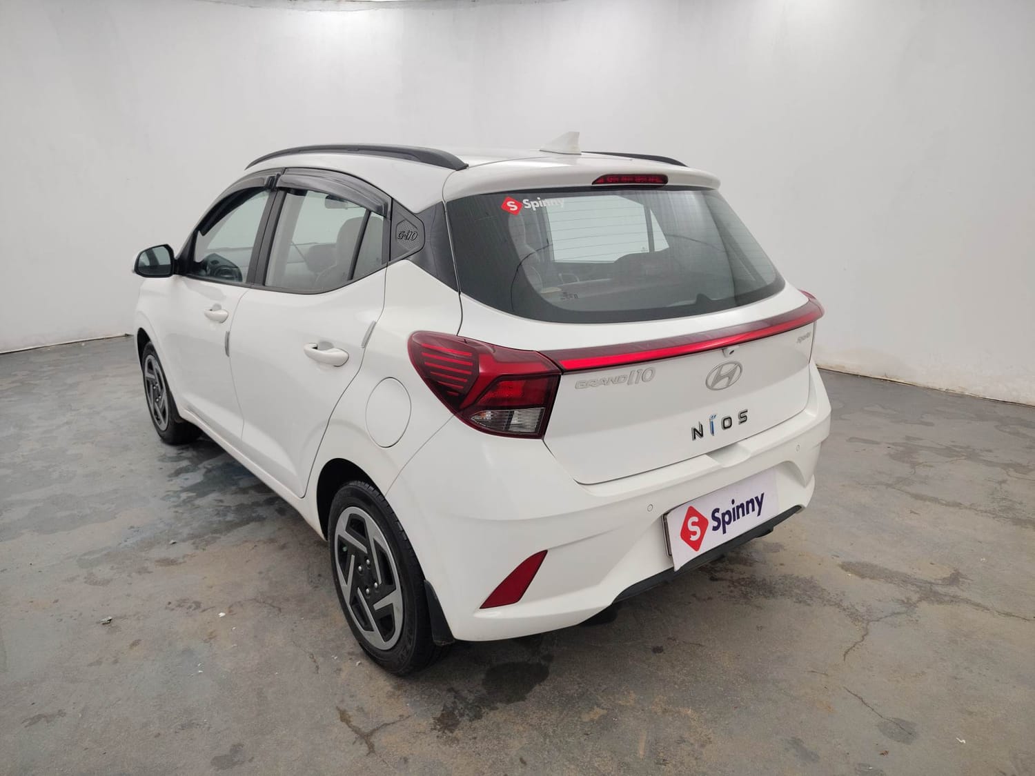Used 2024 Hyundai Grand i10 Nios Sportz 1.2 Kappa VTVT Petrol Manual exterior LEFT REAR CORNER VIEW