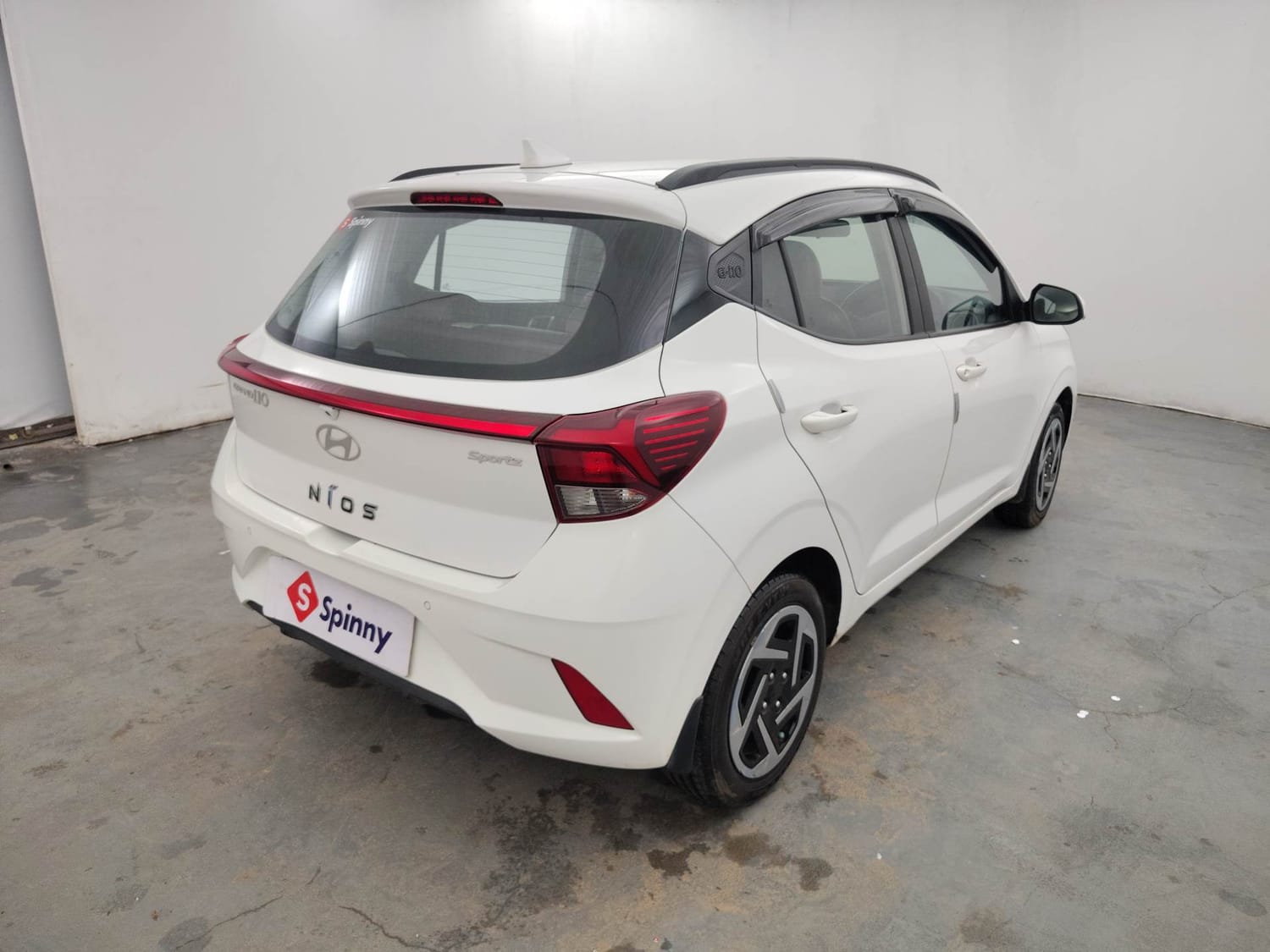 Used 2024 Hyundai Grand i10 Nios Sportz 1.2 Kappa VTVT Petrol Manual exterior RIGHT REAR CORNER VIEW