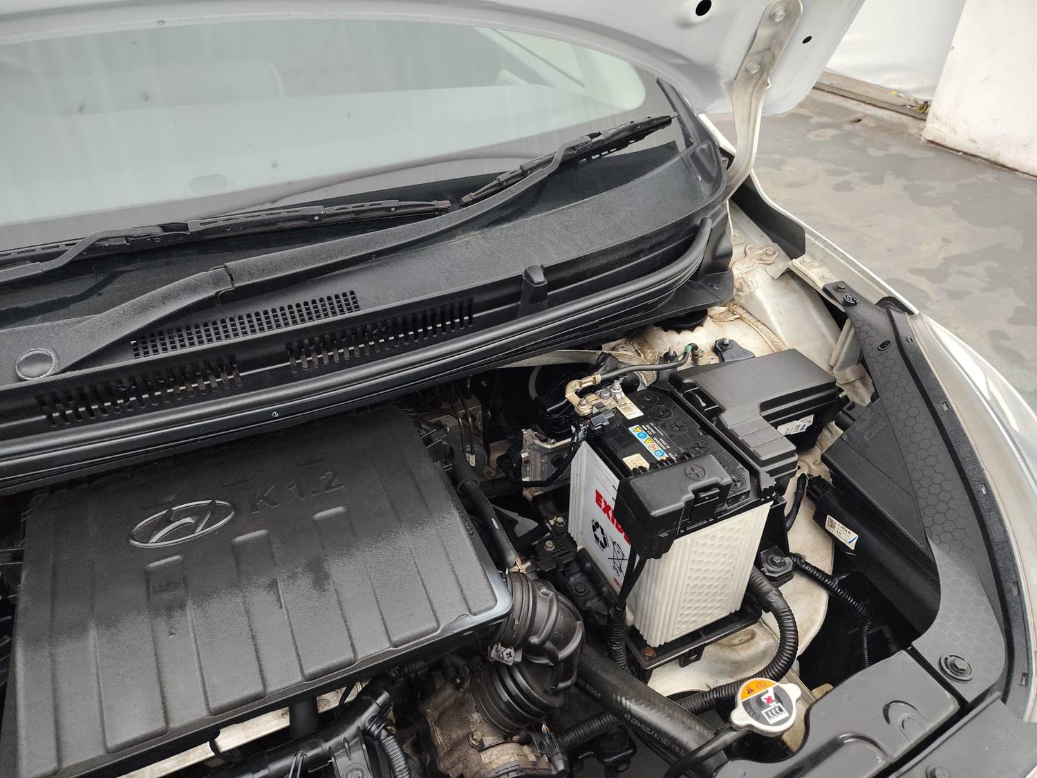 Used 2024 Hyundai Grand i10 Nios Sportz 1.2 Kappa VTVT Petrol Manual engine ENGINE LEFT SIDE HINGE & APRON VIEW