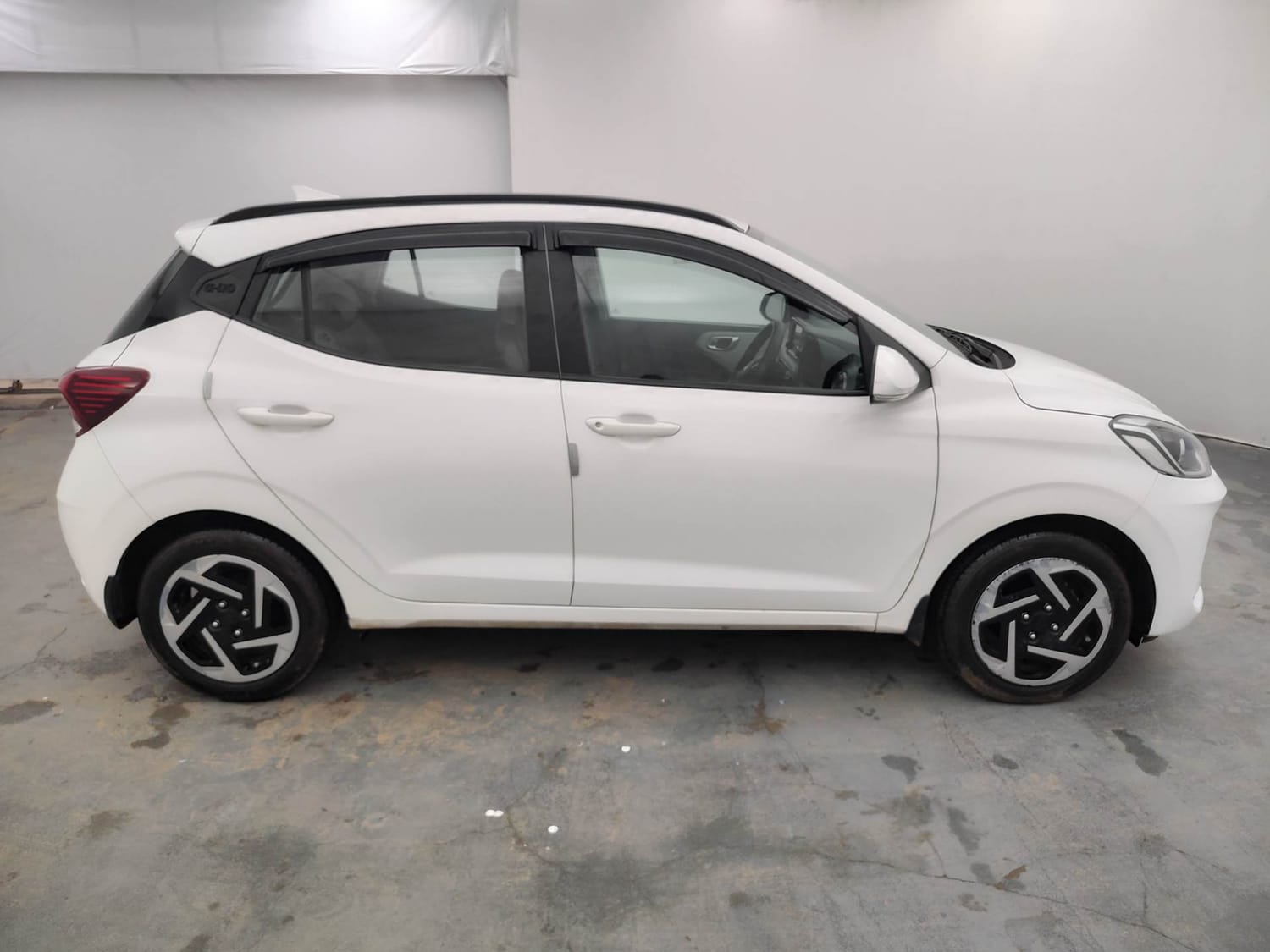 Used 2024 Hyundai Grand i10 Nios Sportz 1.2 Kappa VTVT Petrol Manual exterior RIGHT SIDE VIEW