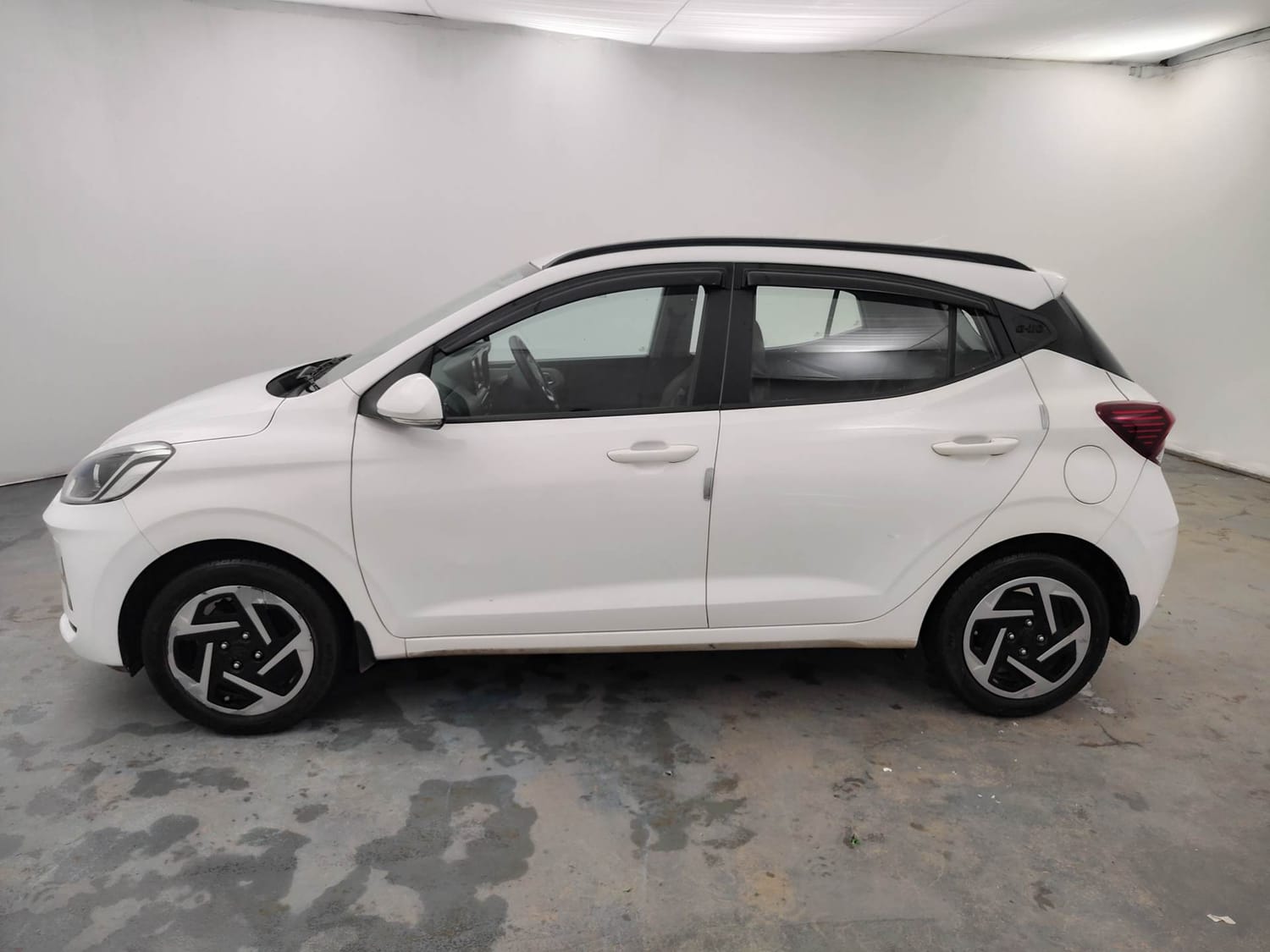 Used 2024 Hyundai Grand i10 Nios Sportz 1.2 Kappa VTVT Petrol Manual exterior LEFT SIDE VIEW