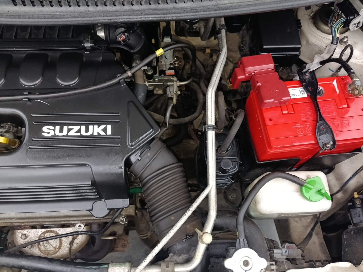Used 2012 Maruti Suzuki Wagon R LXi Petrol Manual engine ENGINE LEFT SIDE VIEW