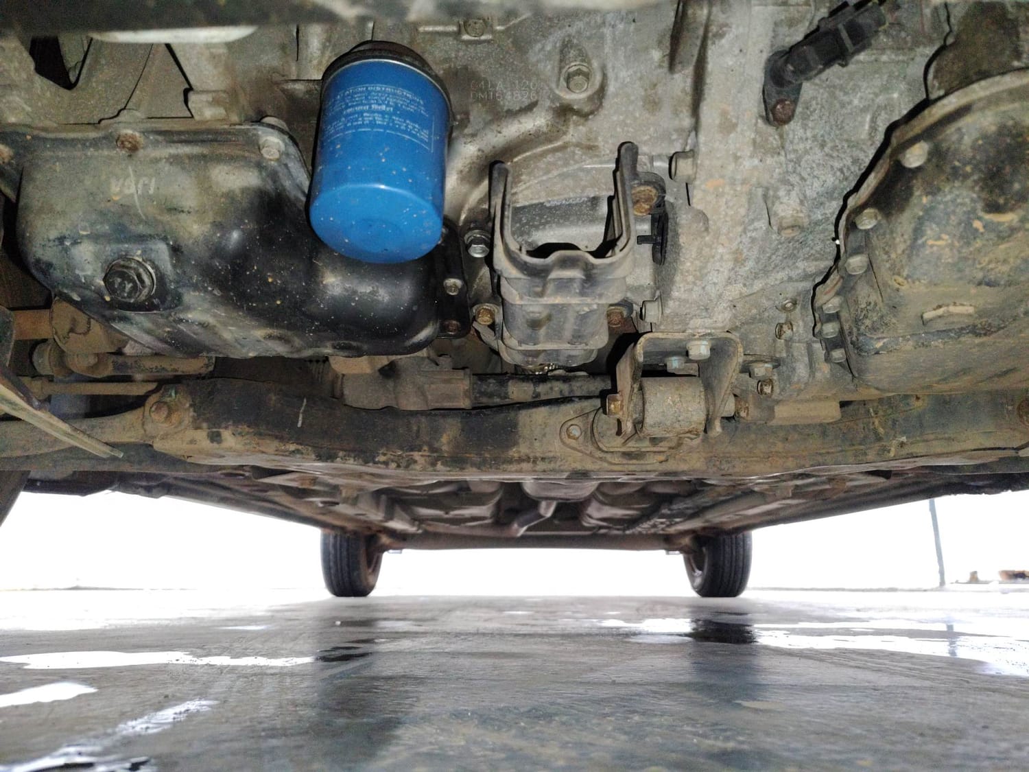 Used 2013 Hyundai Grand i10 Sportz AT 1.2 Kappa VTVT Petrol Automatic extra FRONT LEFT UNDERBODY VIEW