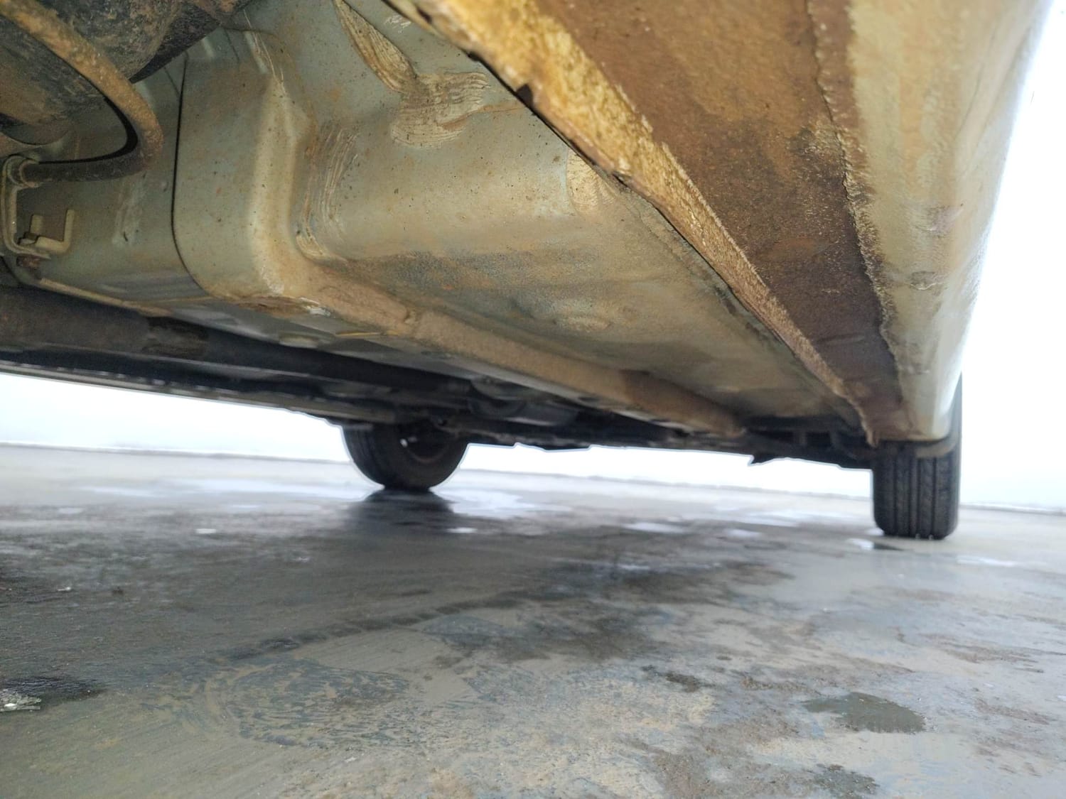 Used 2013 Hyundai Grand i10 Sportz AT 1.2 Kappa VTVT Petrol Automatic extra REAR RIGHT UNDERBODY VIEW