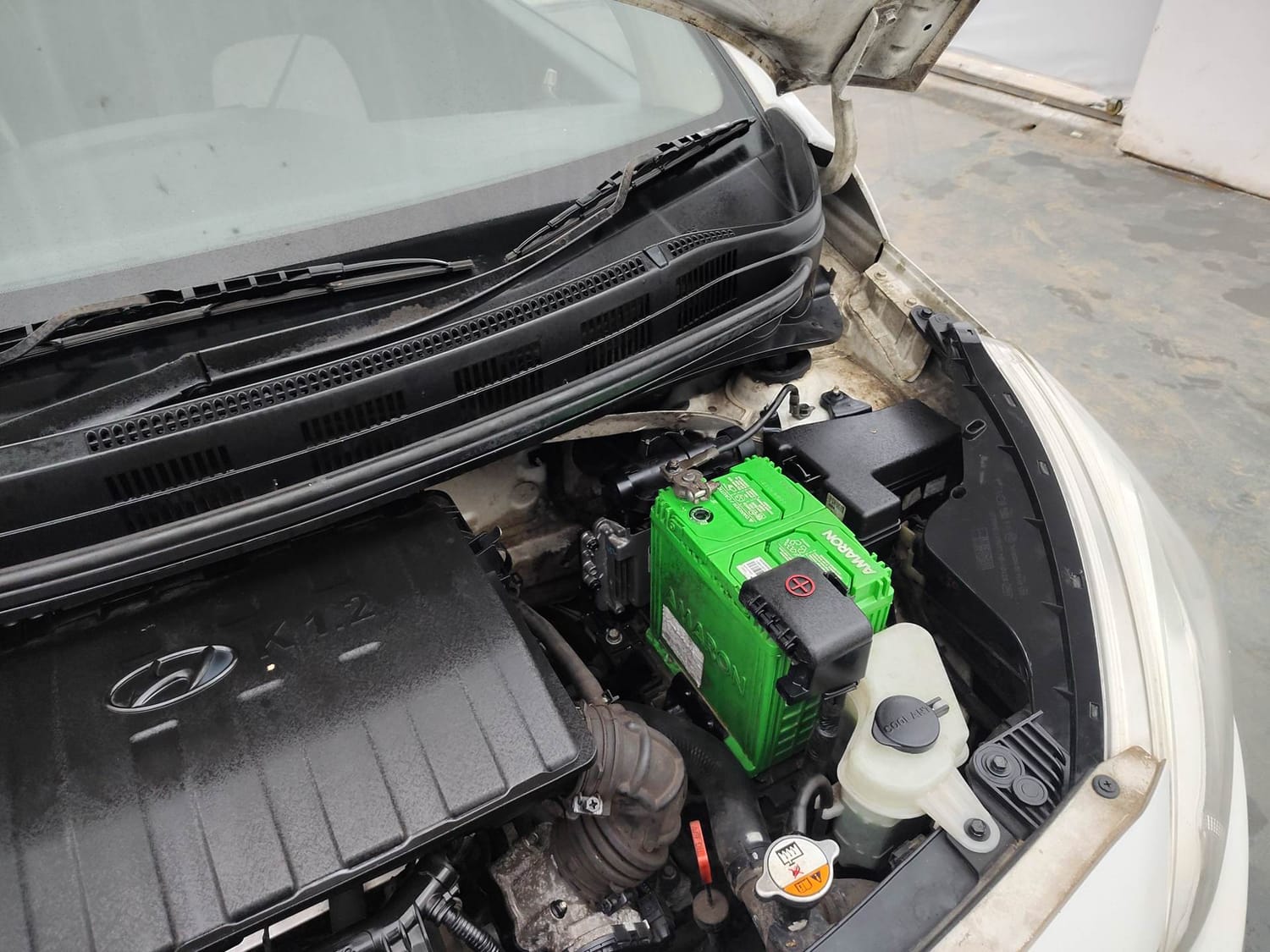 Used 2013 Hyundai Grand i10 Sportz AT 1.2 Kappa VTVT Petrol Automatic engine ENGINE LEFT SIDE HINGE & APRON VIEW