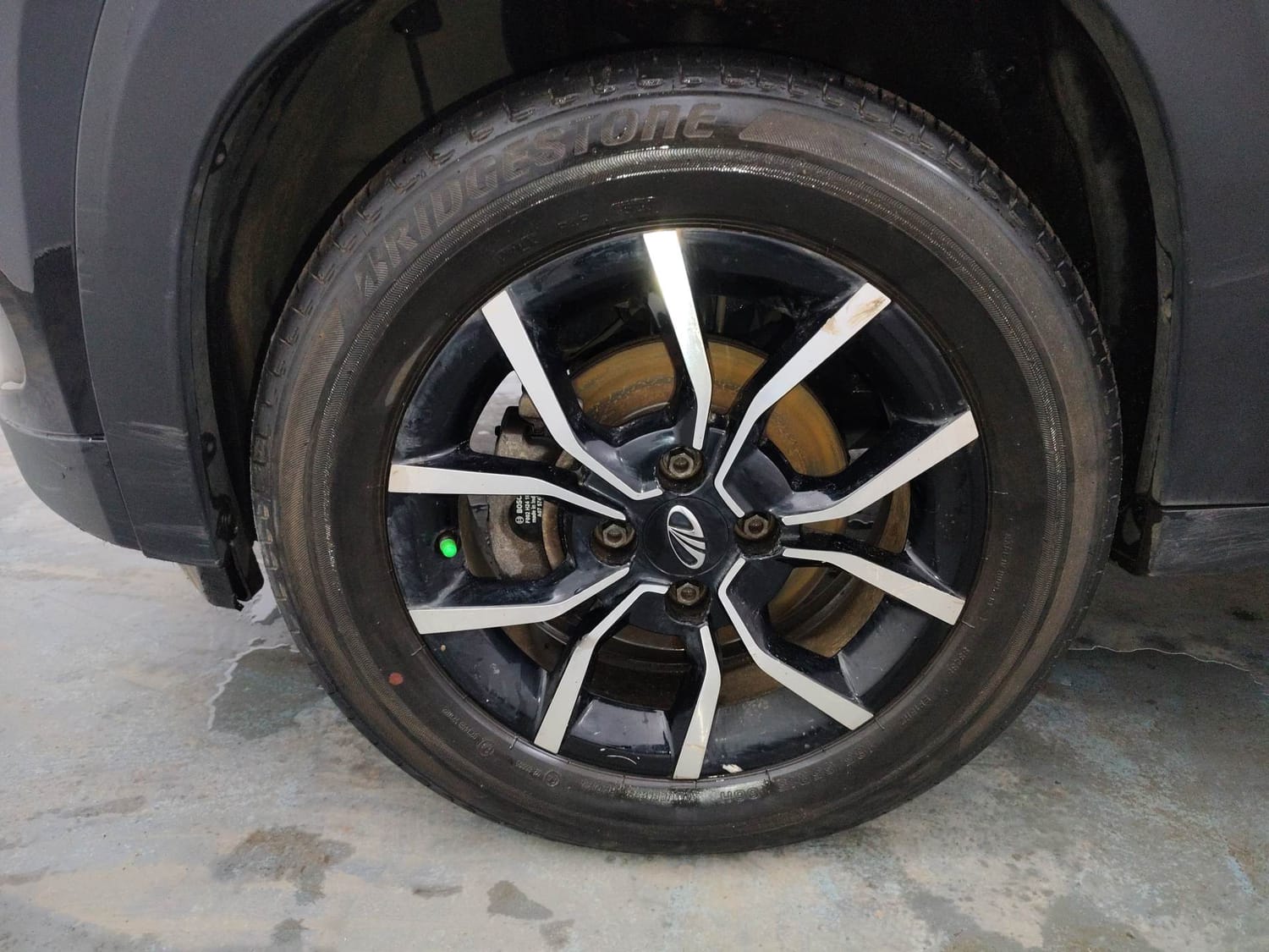 Used 2018 Mahindra KUV100 NXT K8 6 STR Petrol Manual tyres LEFT FRONT TYRE RIM VIEW