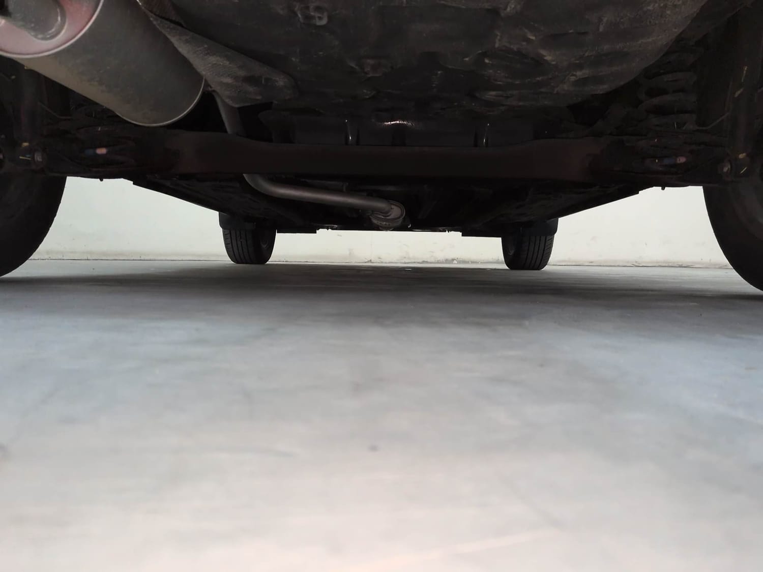 Used 2026 Nissan Magnite Tekna Plus HRAO 1.0 Turbo Petrol MT Dual Tone Petrol Manual extra REAR UNDERBODY VIEW (TAKEN FROM REAR)