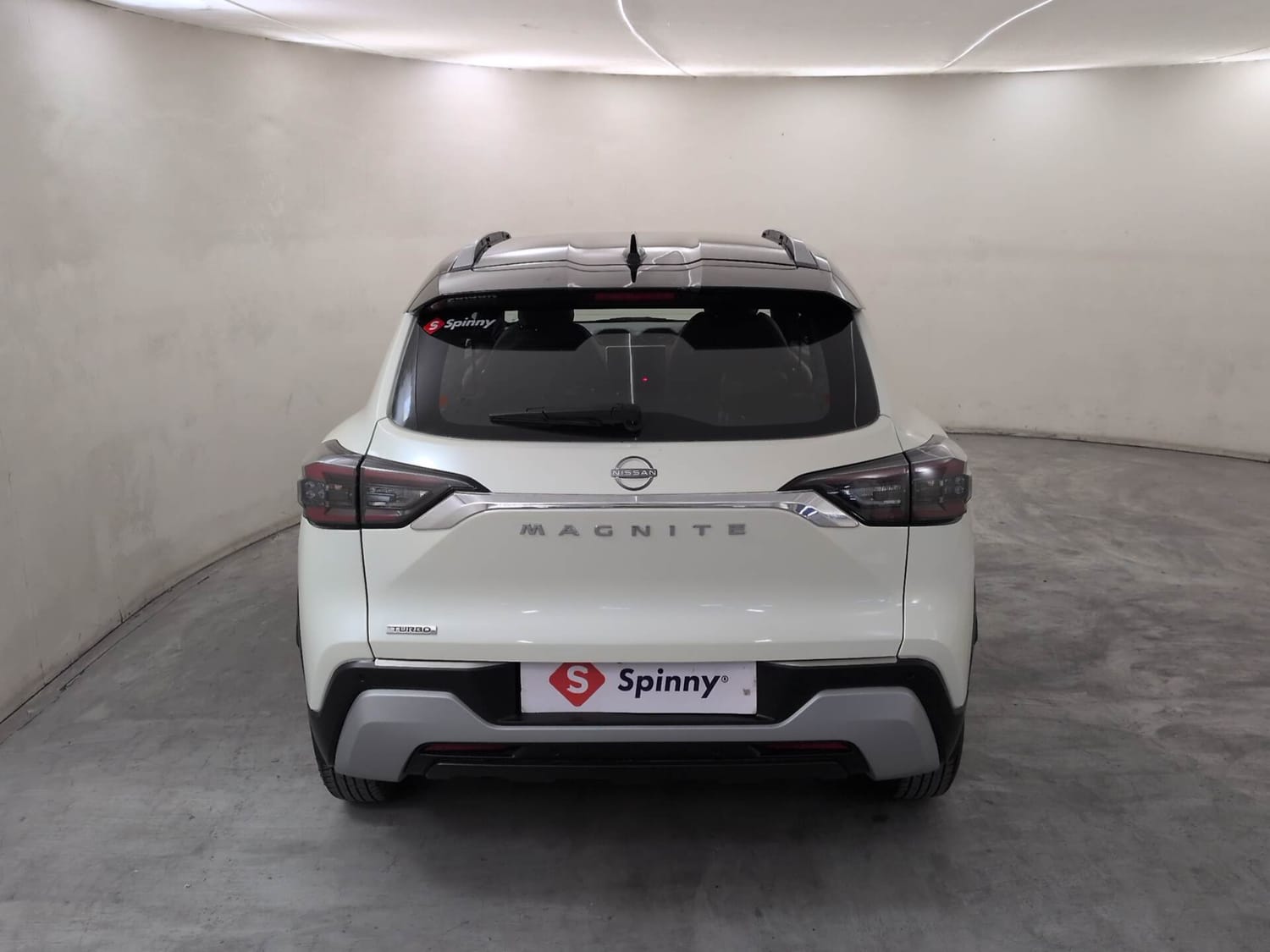 Used 2026 Nissan Magnite Tekna Plus HRAO 1.0 Turbo Petrol MT Dual Tone Petrol Manual exterior BACK VIEW