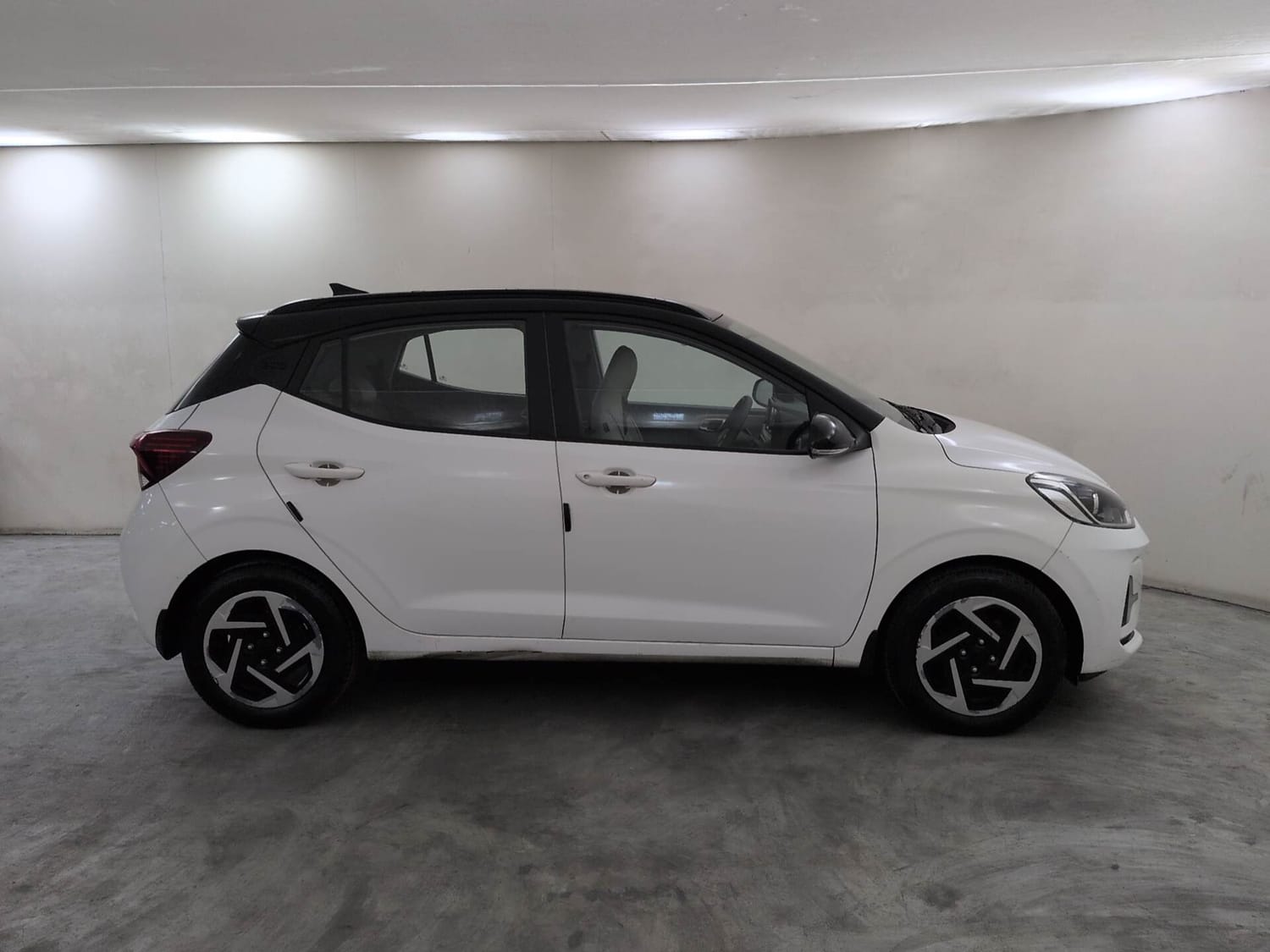 Used 2023 Hyundai Grand i10 Nios Sportz 1.2 Kappa VTVT Petrol Manual exterior RIGHT SIDE VIEW