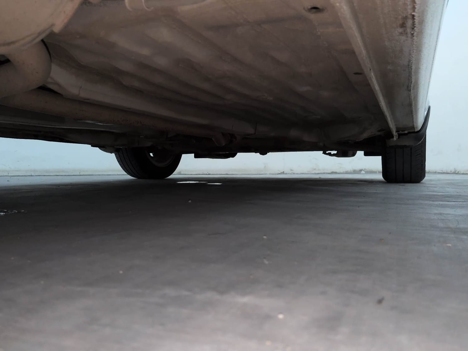 Used 2024 Honda Amaze VX 1.2 Petrol CVT Petrol Automatic extra REAR RIGHT UNDERBODY VIEW