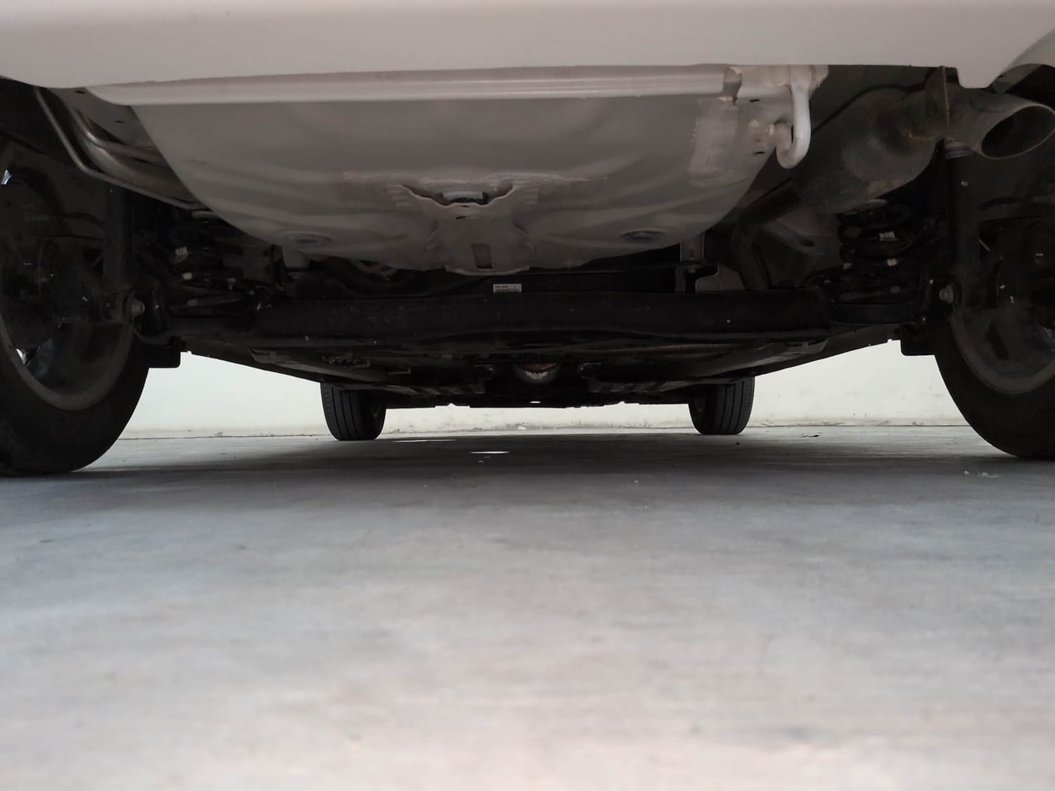 Used 2025 Maruti Suzuki Dzire ZXi AMT Petrol Automatic extra REAR UNDERBODY VIEW (TAKEN FROM REAR)