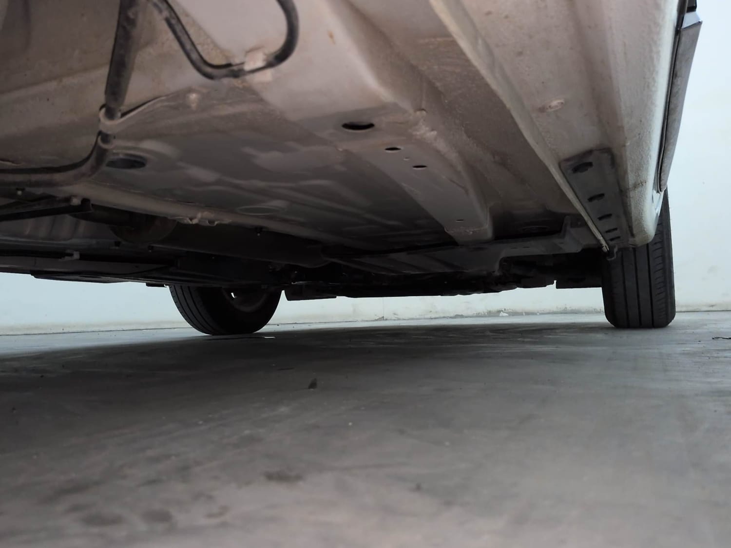 Used 2025 Maruti Suzuki Dzire ZXi AMT Petrol Automatic extra REAR RIGHT UNDERBODY VIEW
