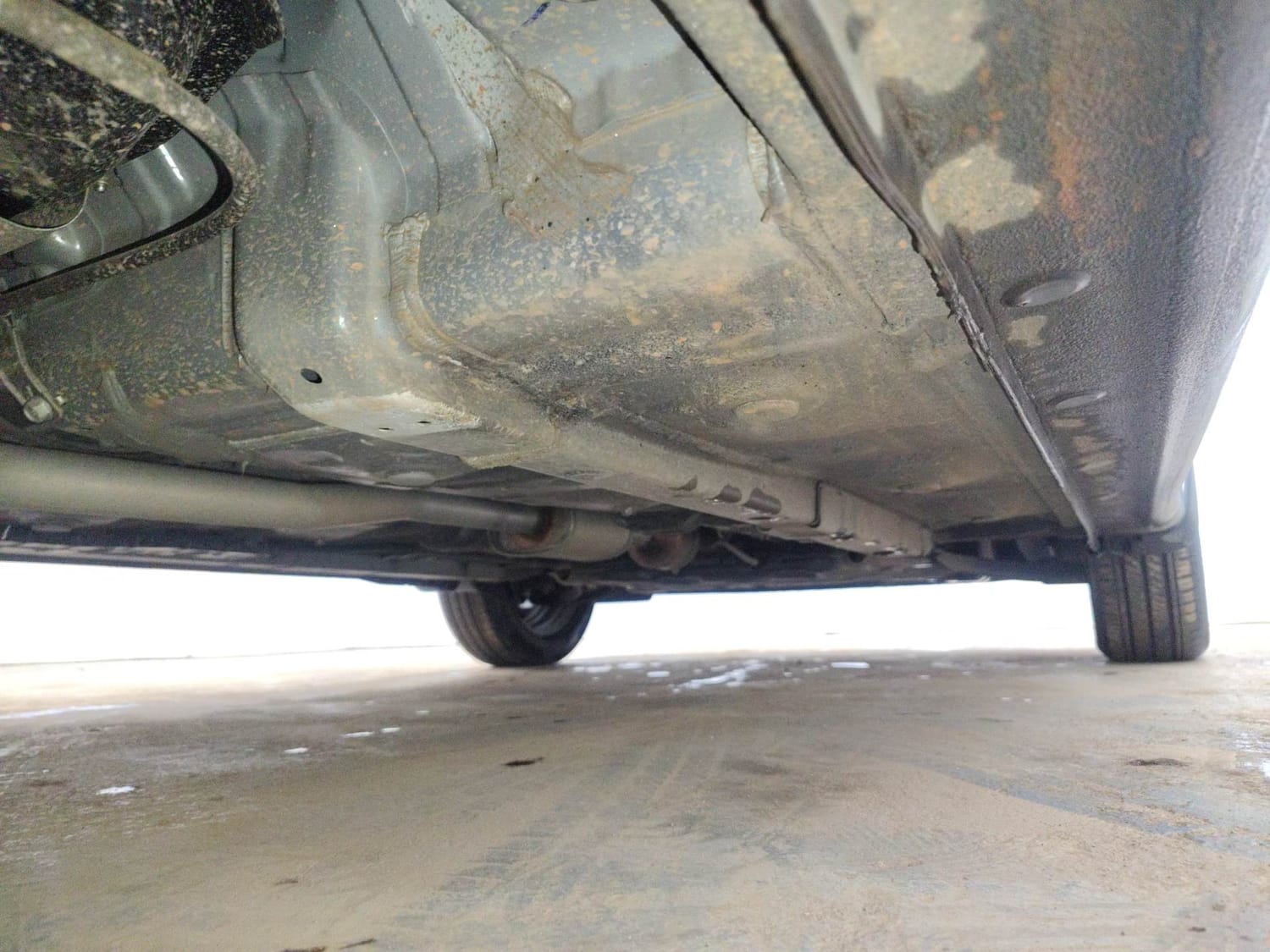 Used 2026 Hyundai Grand i10 Nios Sportz 1.2 Kappa AMT Petrol Automatic extra REAR RIGHT UNDERBODY VIEW