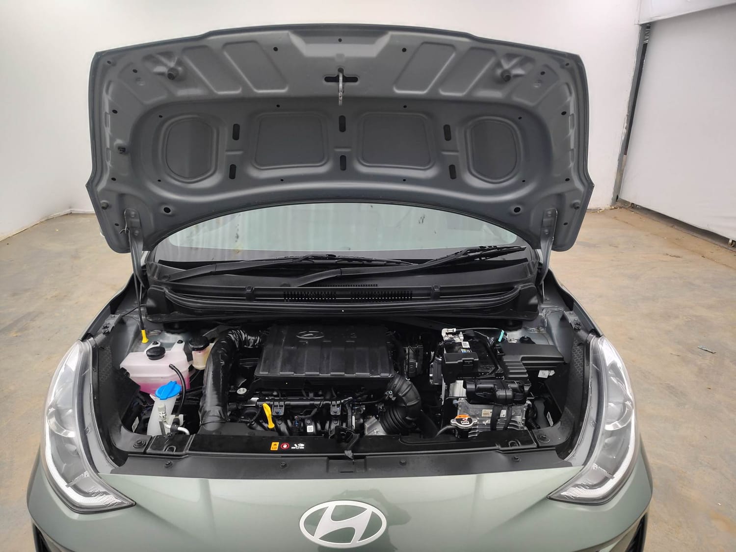 Used 2026 Hyundai Grand i10 Nios Sportz 1.2 Kappa AMT Petrol Automatic engine ENGINE & BONNET OPEN FRONT VIEW