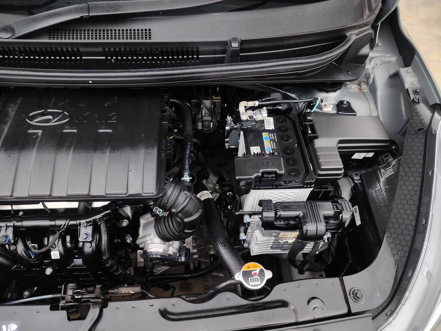 Used 2026 Hyundai Grand i10 Nios Sportz 1.2 Kappa AMT Petrol Automatic engine ENGINE LEFT SIDE VIEW
