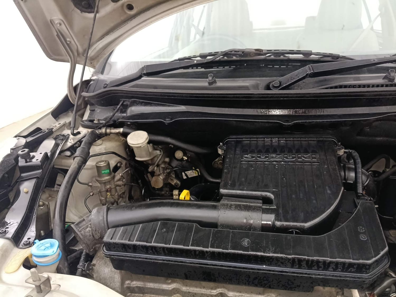 Used 2012 Maruti Suzuki Swift Dzire VXI Petrol Manual engine ENGINE RIGHT SIDE HINGE & APRON VIEW