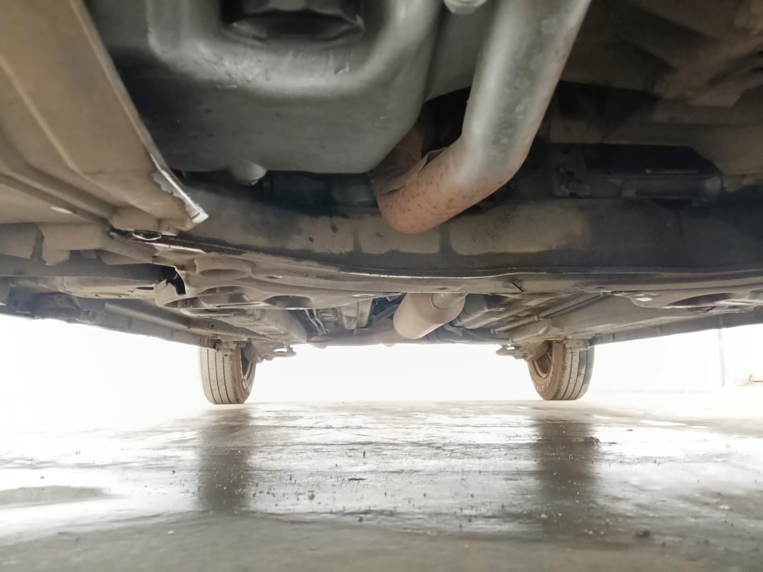 Used 2012 Maruti Suzuki Swift Dzire VXI Petrol Manual extra FRONT LEFT UNDERBODY VIEW