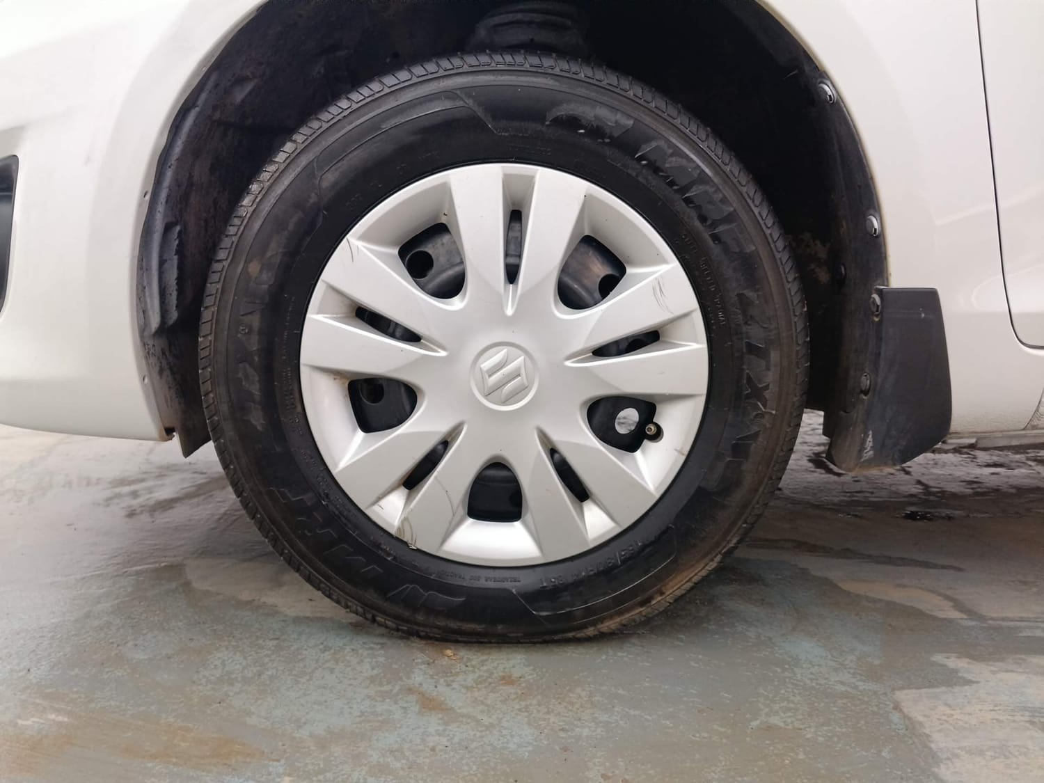 Used 2012 Maruti Suzuki Swift Dzire VXI Petrol Manual tyres LEFT FRONT TYRE RIM VIEW