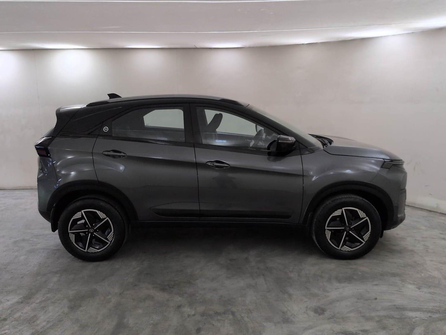 Used 2025 Tata Nexon Fearless Plus S 1.2 Revotron Petrol 6MT DT Petrol Manual exterior RIGHT SIDE VIEW