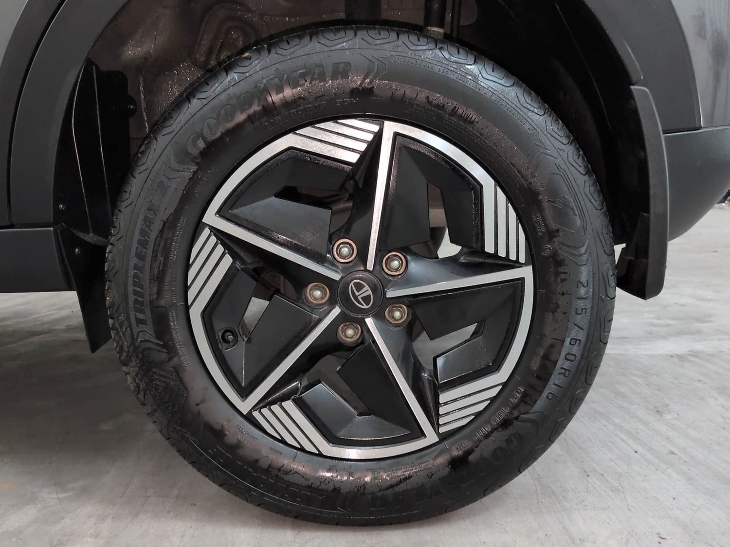 Used 2025 Tata Nexon Fearless Plus S 1.2 Revotron Petrol 6MT DT Petrol Manual tyres LEFT REAR TYRE RIM VIEW