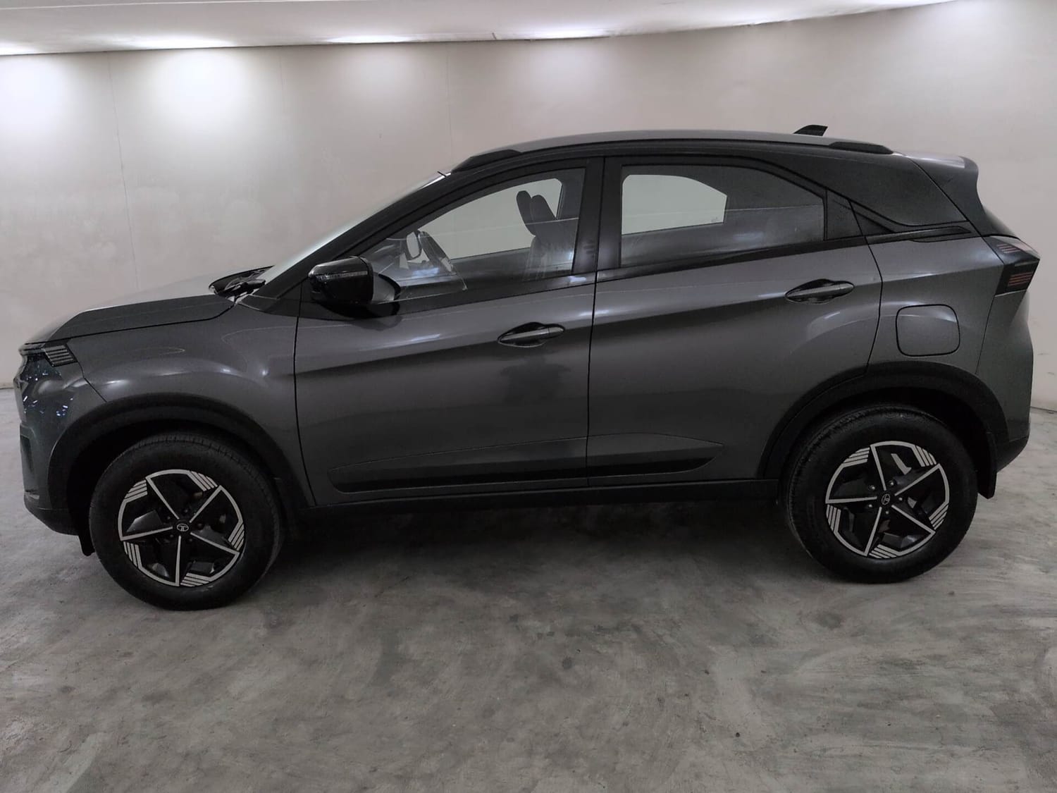 Used 2025 Tata Nexon Fearless Plus S 1.2 Revotron Petrol 6MT DT Petrol Manual exterior LEFT SIDE VIEW