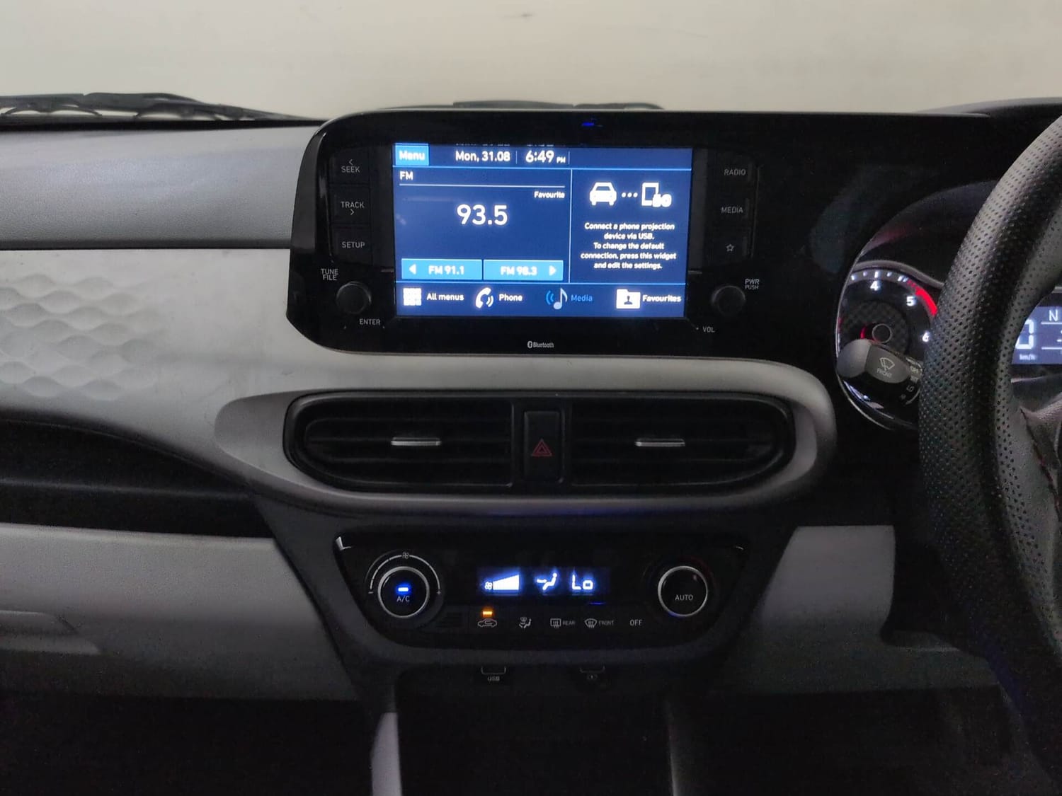 Used 2021 Hyundai Grand i10 Nios Sportz AMT 1.2 CRDi Diesel Automatic interior MUSIC SYSTEM & AC CONTROL VIEW