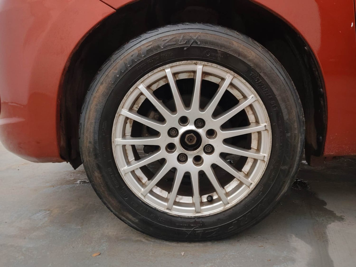 Used 2014 Maruti Suzuki Celerio VXi AMT Petrol Automatic tyres LEFT FRONT TYRE RIM VIEW