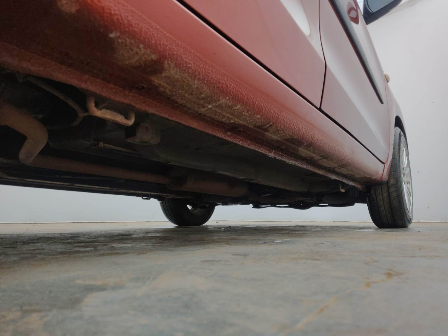 Used 2014 Maruti Suzuki Celerio VXi AMT Petrol Automatic extra REAR RIGHT UNDERBODY VIEW