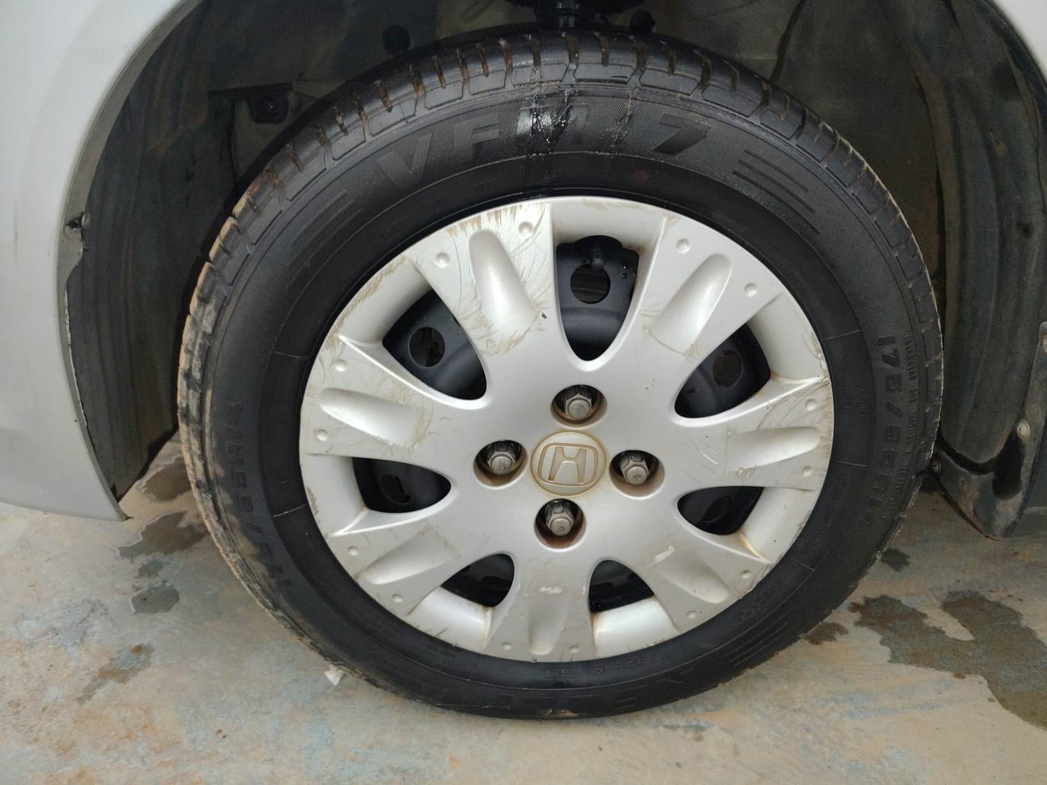 Used 2013 Honda Brio S MT Petrol Manual tyres LEFT FRONT TYRE RIM VIEW