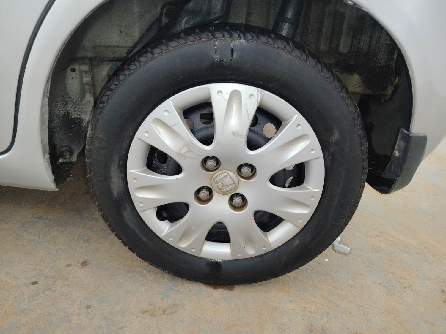 Used 2013 Honda Brio S MT Petrol Manual tyres LEFT REAR TYRE RIM VIEW