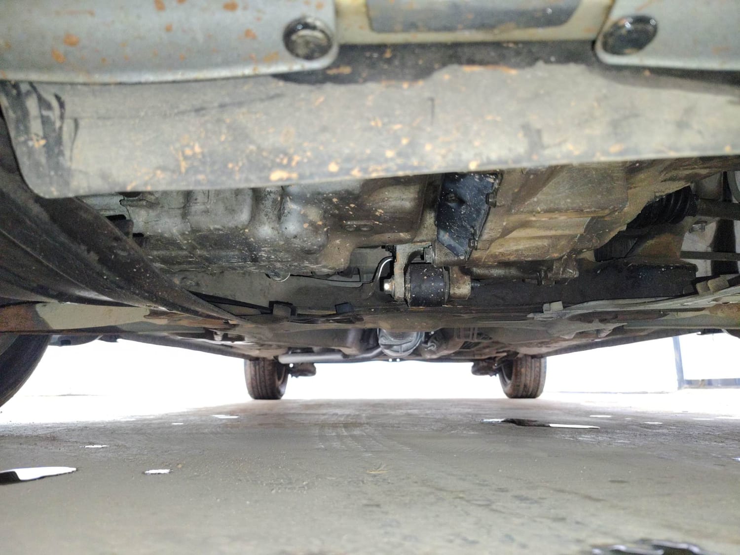 Used 2013 Honda Brio S MT Petrol Manual extra FRONT LEFT UNDERBODY VIEW