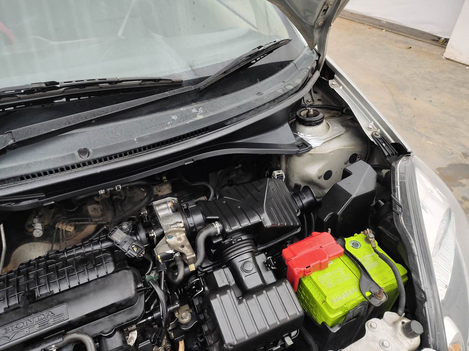 Used 2013 Honda Brio S MT Petrol Manual engine ENGINE LEFT SIDE HINGE & APRON VIEW