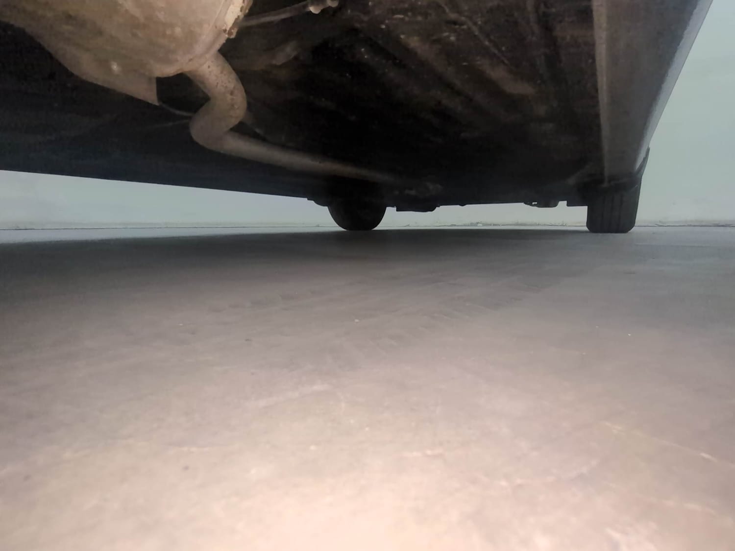Used 2023 Honda Amaze VX 1.2 Petrol CVT Petrol Automatic extra REAR RIGHT UNDERBODY VIEW