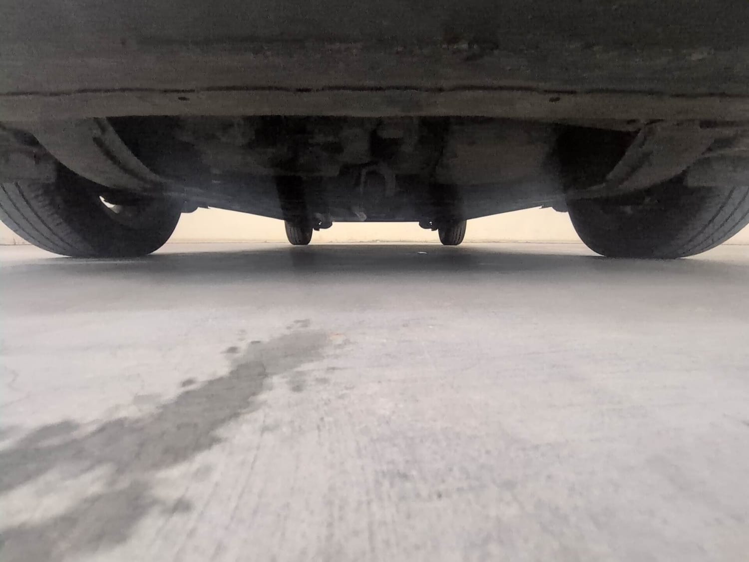 Used 2023 Honda Amaze VX 1.2 Petrol CVT Petrol Automatic extra FRONT LEFT UNDERBODY VIEW