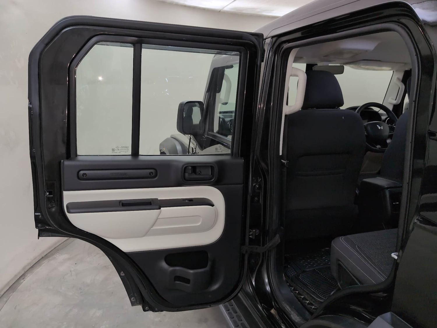 Used 2025 Mahindra Thar Roxx MX3 Diesel MT 2WD Diesel Manual interior LEFT REAR DOOR OPEN VIEW